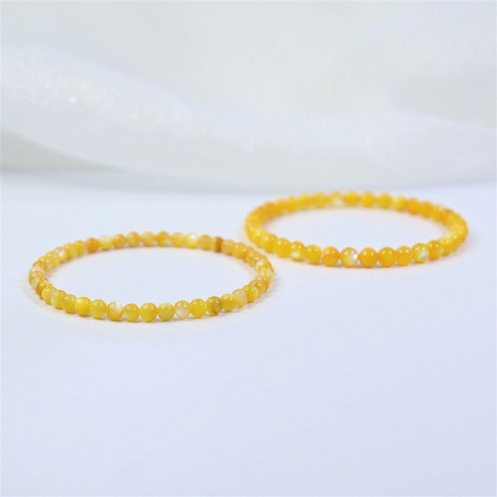 Natural Yellow Shell Bead Hand Polished Fade-Proof Wealth Attracting Bracelet
Detail Image Alt Texts
Hand polished natural yellow shell elastic cord daily wrist bracelet
Fade-proof authentic shell jewelry for wealth luck and outfit matching
Elegant natural shell fortune bracelet for gift and personal collection