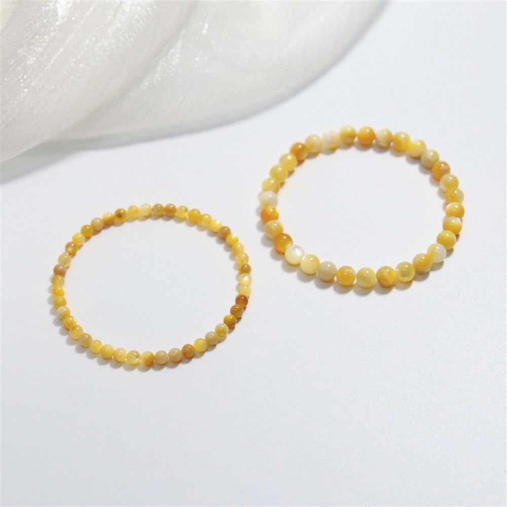 Natural Yellow Shell Bead Hand Polished Fade-Proof Wealth Attracting Bracelet
Detail Image Alt Texts
Hand polished natural yellow shell elastic cord daily wrist bracelet
Fade-proof authentic shell jewelry for wealth luck and outfit matching
Elegant natural shell fortune bracelet for gift and personal collection