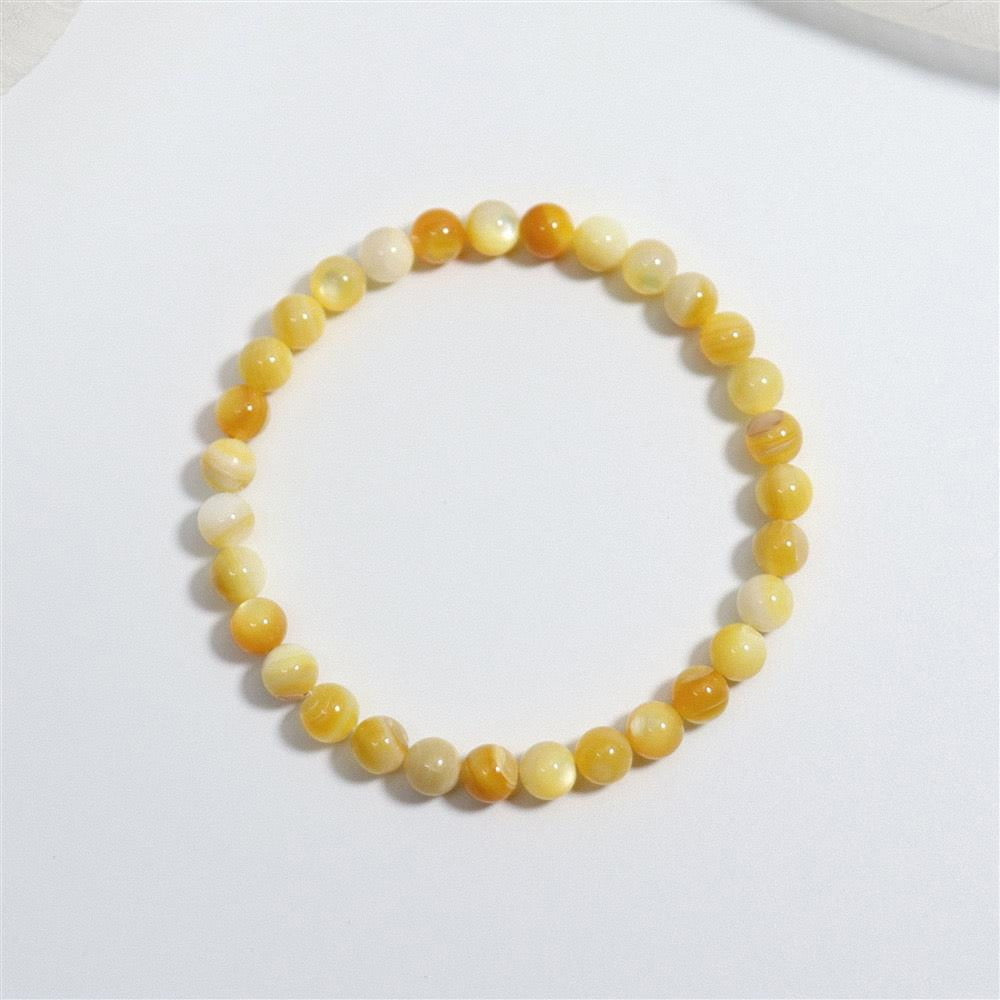 Natural Yellow Shell Bead Hand Polished Fade-Proof Wealth Attracting Bracelet
Detail Image Alt Texts
Hand polished natural yellow shell elastic cord daily wrist bracelet
Fade-proof authentic shell jewelry for wealth luck and outfit matching
Elegant natural shell fortune bracelet for gift and personal collection