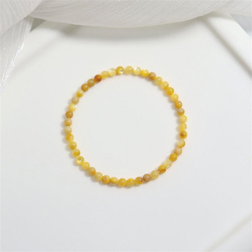 Natural Yellow Shell Bead Hand Polished Fade-Proof Wealth Attracting Bracelet
Detail Image Alt Texts
Hand polished natural yellow shell elastic cord daily wrist bracelet
Fade-proof authentic shell jewelry for wealth luck and outfit matching
Elegant natural shell fortune bracelet for gift and personal collection